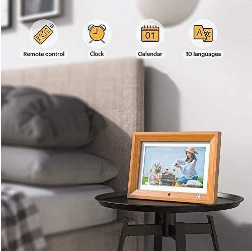 Kodak 10-inch Digital Photo Frame in Burlywood Frame on bedside table