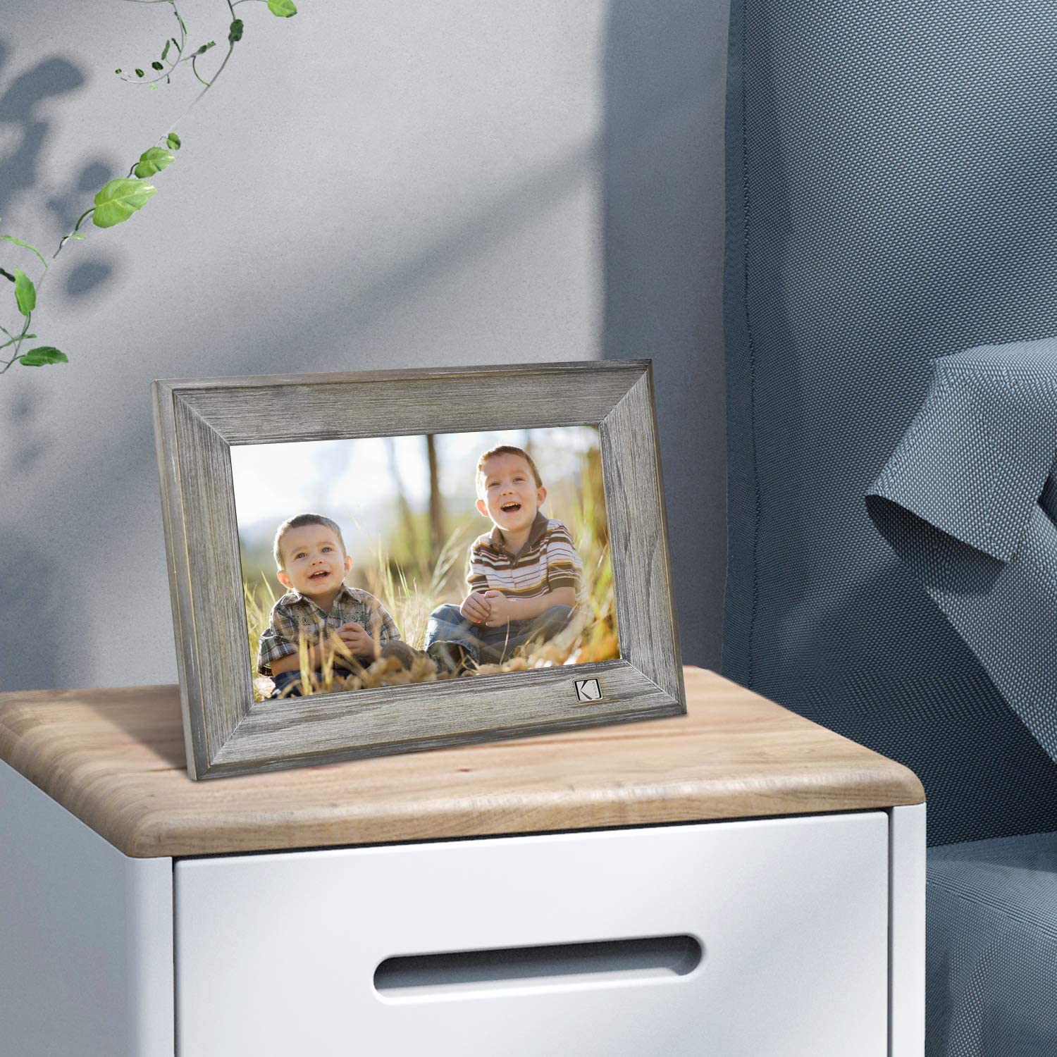Kodak Classic Digital Photo Frame Wood 10 inch display on bedside table