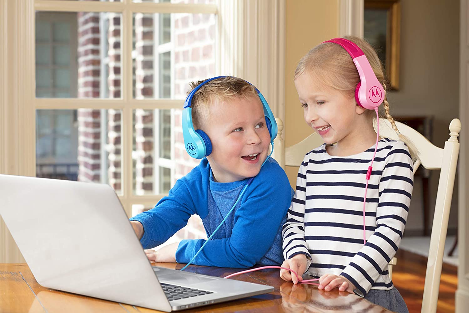 kids wearing blue and pink Motorola Squads 200 Kids Corded Headphone