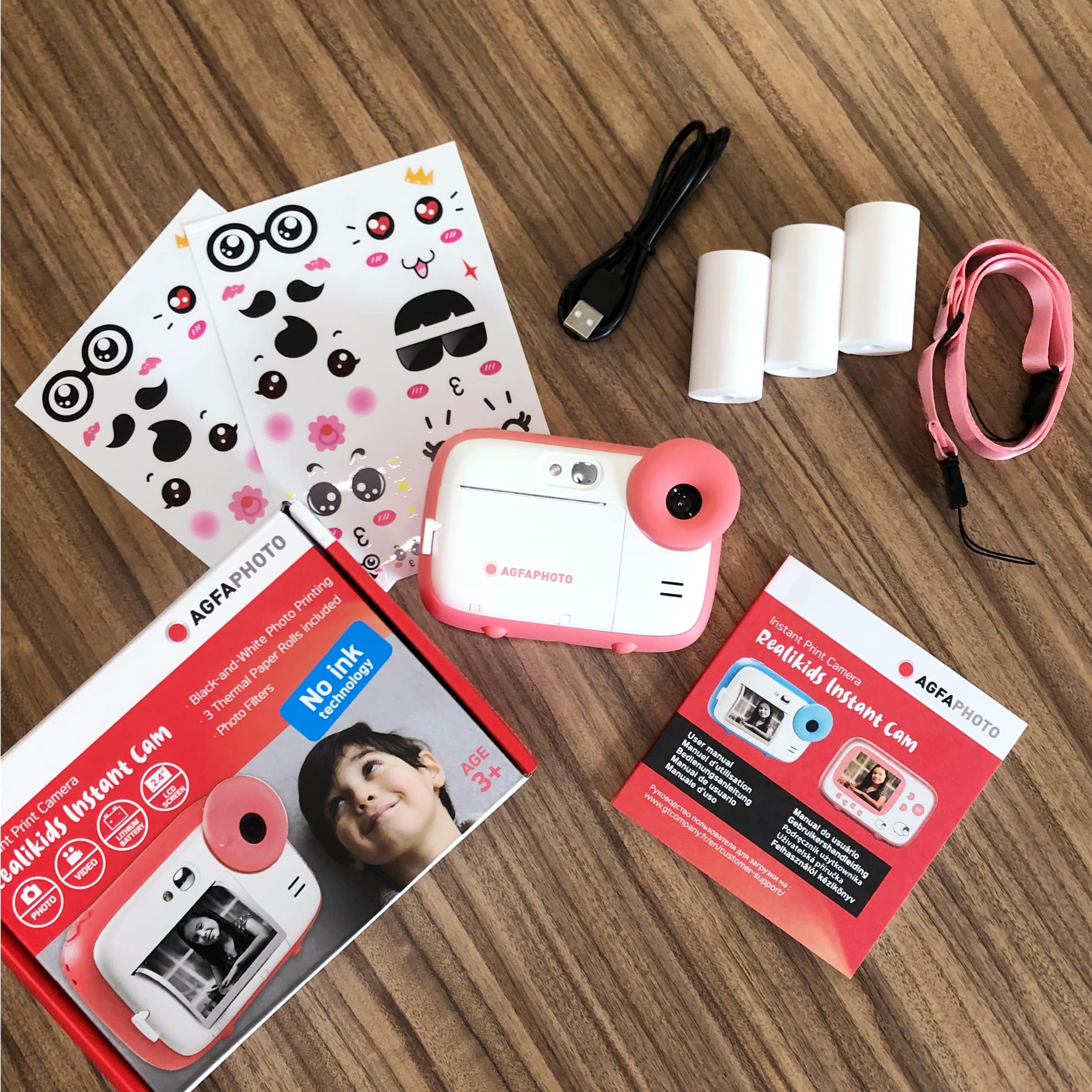 The Realikids Instant Cam is both a digital camera that takes photos/videos  and an instant camera that prints 5.7 x 10 cm black and white photos. No  ink, By AgfaPhoto Europe