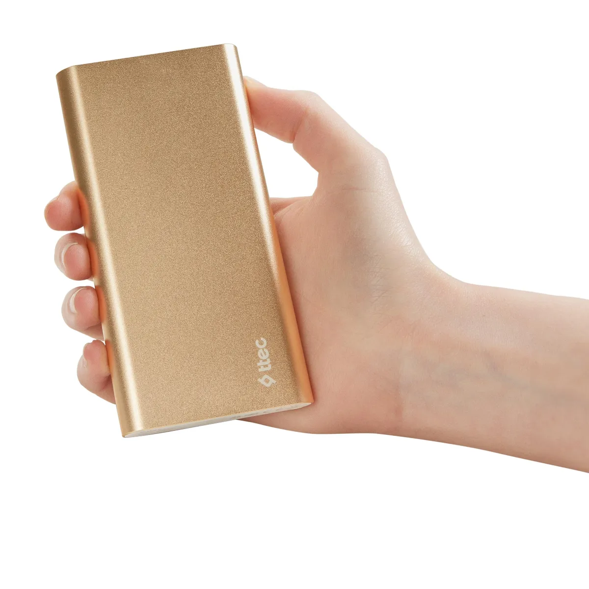 ttec AlumiSlim S Universal Mobile Charger Power Bank 10000 mAh in gold size comparison to hand.